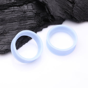 Detail View 1 of A Pair of Ultra Flexible Pastel Blue Silicone Double Flared Tunnel Plug